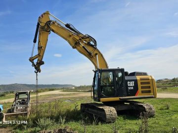 Excavator pe senile Caterpillar CAT 323E